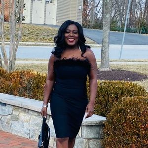 Black form fitting Dress with feathers. Black Cocktail Dress